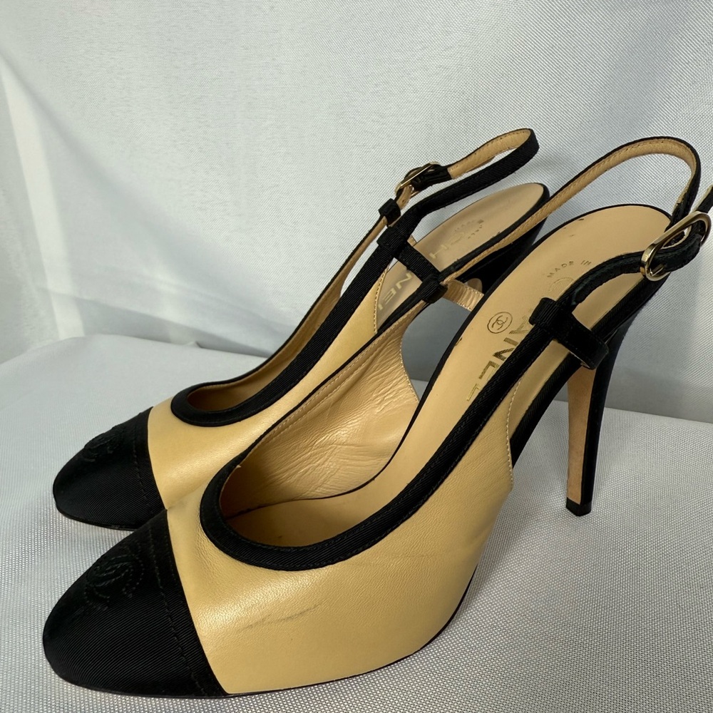 CHANEL Black and Cream Slingback Heels with Cap-Toe Design